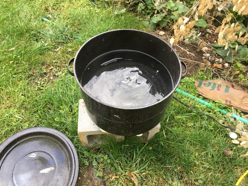 Tools for plucking chickens - large kettle can act like a scalder