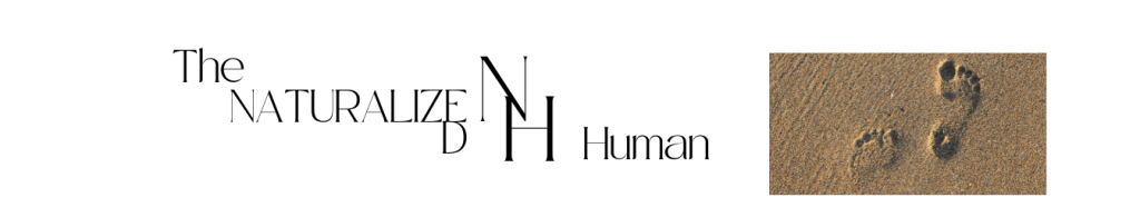 The Naturalized Human Logo with human footprints in the sand